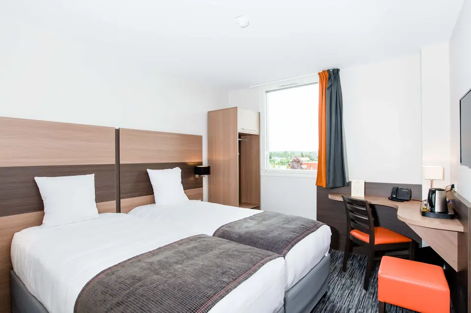 Chambre twin avec deux lits simples